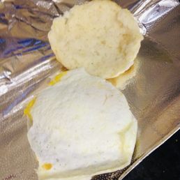 Nice cooked fried egg in a Sausage and Egg Biscuit