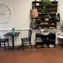 She Brews Coffee House - Inside and merch