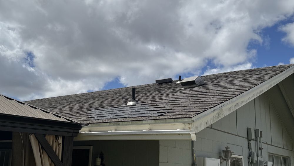 Slide of J&E ROOFING