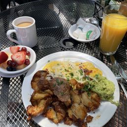 The Denver Omelet with fresh fruit, coffee and OJ. The Denver Omelet with fresh fruit, coffee and OJ.