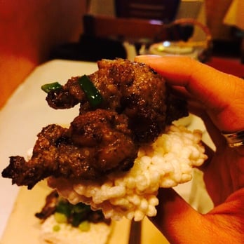 Tamarind Tree Restaurant - Um... "Crispy" rice and grilled pork...looks and feels like a rice Krispy - Vietnamese Near Me - Seattle, Washington