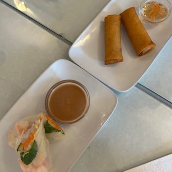 Tuk Tuk - two plates of food on a table - Cambodian Near Me - Montreal, Quebec Tuk Tuk - two plates of food on a table - Cambodian Near Me - Montreal, Quebec