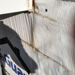 4 U Construction - Siding removed where wall meets roof, not sure where these guys learned how to install flashing.