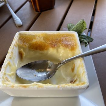 Rick's On Main - Half eaten Creme Brulee. - New American Near Me - East Aurora, New York