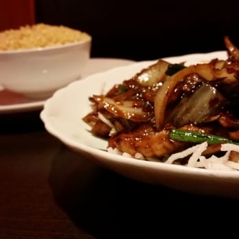 Peony Asian Bistro - Mongolian chicken on a bed of fried rice noodles. - Chinese Near Me - Durham, North Carolina Peony Asian Bistro - Mongolian chicken on a bed of fried rice noodles. - Chinese Near Me - Durham, North Carolina