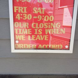 Larsen's Catering - Funny Display sign showing the hours.