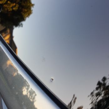 Sandpiper Collision - first glass replacement done with defective glass that had these pock marks all over it. Took it back a second time to get it replaced again - Body Shops Near Me - Costa Mesa, California
