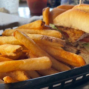 Rick's On the River - Rick 's Famous Grouper Sandwich. Half size with fries. Pretty darn good. - New American Near Me - Tampa, Florida Rick's On the River - Rick 's Famous Grouper Sandwich. Half size with fries. Pretty darn good. - New American Near Me - Tampa, Florida