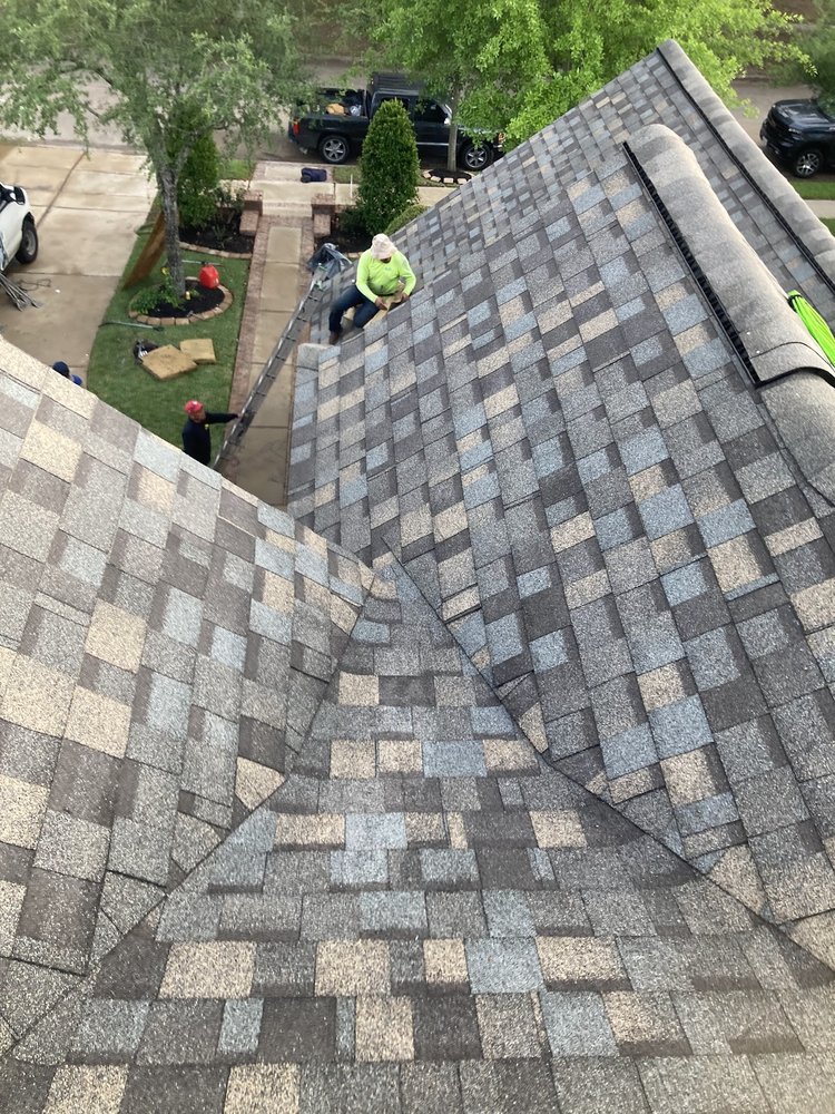 Slide of Compass Roofing