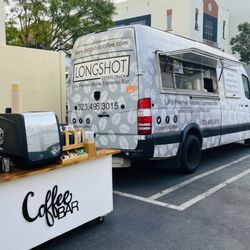 A double set up including a coffee truck and mobile coffee cart serving the crew at production.