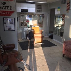 Lisa's Barber Shop - The seat is warm and ready !