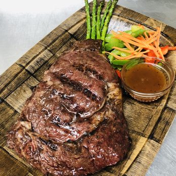Thai 101 - a steak with asparagus and sauce - Thai Near Me - Salt Lake City, Utah Thai 101 - a steak with asparagus and sauce - Thai Near Me - Salt Lake City, Utah