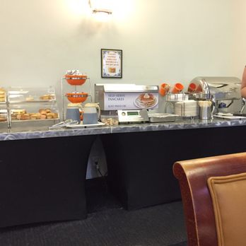Hotel CURRENT - Full breakfast bar w/ eggs & sausage, pancake maker, cereal, juice, muffins and bagels, fruits, and coffee!! - Hotels Near Me - Long Beach, California