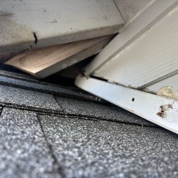 Acme Roofing - Board removed during roofing.  Roof under board visible.  Acme failed to replace appropriately, leaving gap.  Pic provided to Acme. - Roofing Near Me - Tacoma, Washington