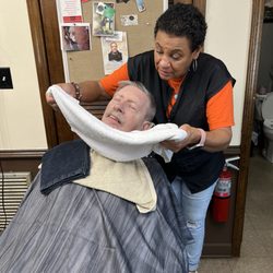 Pampered Cuts and Shave - Hot towels before the straight blade shave. Gentlemen this is a must to experience.