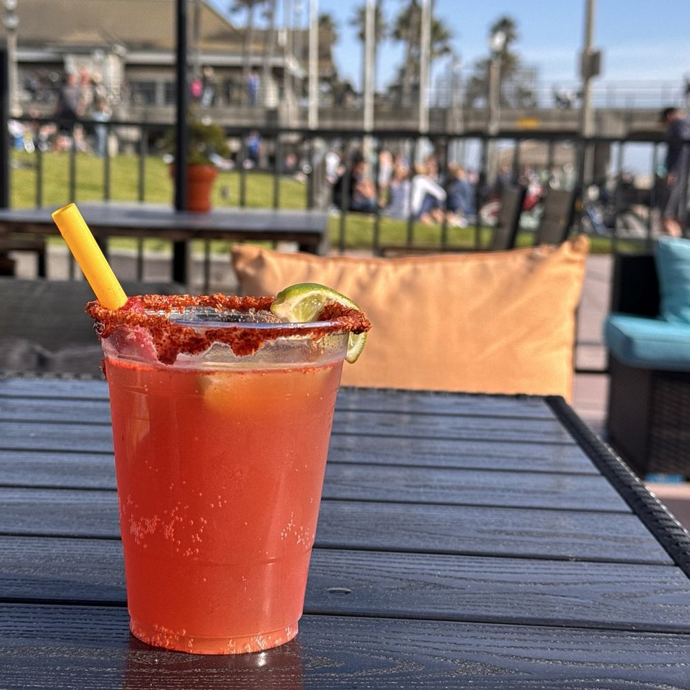 Patio seating drinking my heavy tomato juice filled michelada Patio seating drinking my heavy tomato juice filled michelada