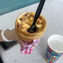 Mac and cheese with bacon in a bread cone