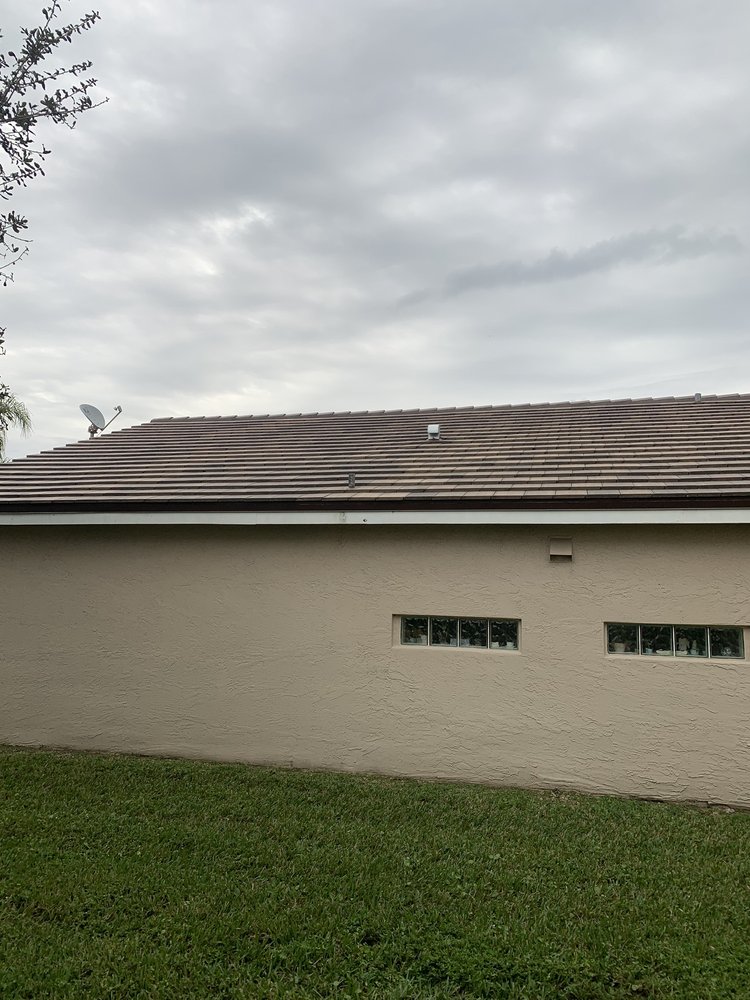 Slide of Earl W. Johnston Roofing