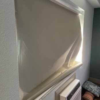 The Beachcomber - Broken window treatment - Hotels Near Me - St. Pete Beach, Florida