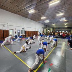 Blue Knight Taekwondo - Mostly new students training to stretch and warm up properly