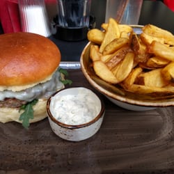 Freigeist - Burger with blue cheese topping and natural fries. Delicious