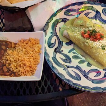 F&D Cantina - Crab and shrimp enchilada with charro beans and rice - Mexican Near Me - Orlando, Florida F&D Cantina - Crab and shrimp enchilada with charro beans and rice - Mexican Near Me - Orlando, Florida