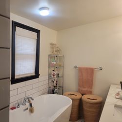 Miguel Garrido - Door and window removal on wall to enclose this bathroom space.
