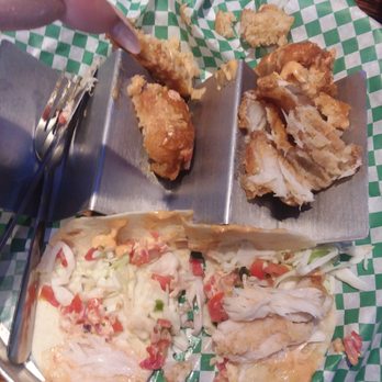Looney's Pub - way too much filler and look at the actually fish amount In the taco on the bottom. - American Near Me - College Park, Maryland