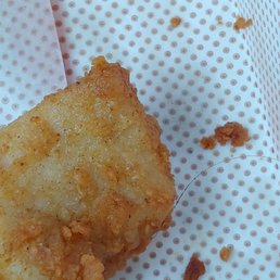 I go to dip my last nugget in and there is a hair imbedded with crust on my last nugget!