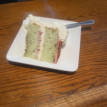 Arts Bar & Grill - Pistachio raspberry cake. - Sports Bars Near Me - Riverside, California