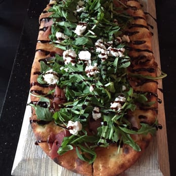 Bellagio Cafe - Prescuitto arugula flat bread with  goat cheese! - Italian Near Me - Vancouver, British Columbia