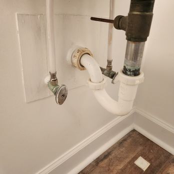 Avalos - a bathroom with a sink and a drain - Carpenters Near Me