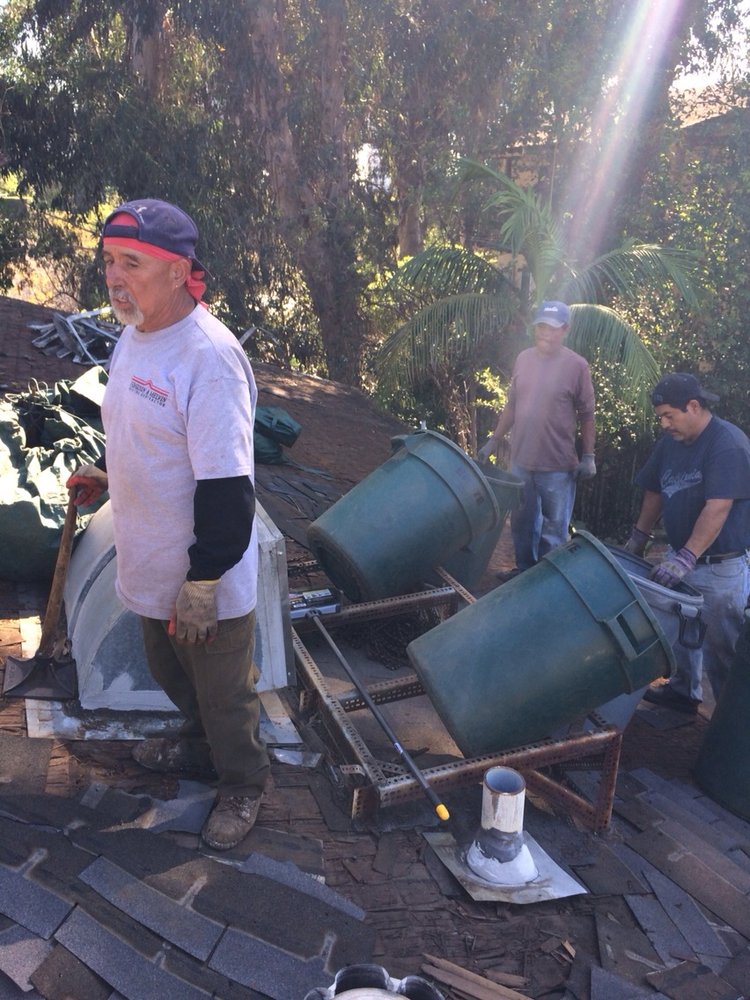 Slide of Ferguson & Melvin Roofing Contractor