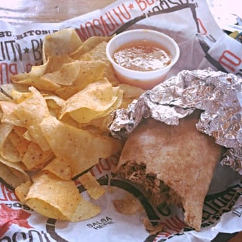Mosquito Burrito - Barbacoa burrito on a wheat tortilla with black beans, queso, lettuce, jalapeños, black olives, and roasted red pepper salsa. - Mexican Near Me - Cleveland, Mississippi Mosquito Burrito - Barbacoa burrito on a wheat tortilla with black beans, queso, lettuce, jalapeños, black olives, and roasted red pepper salsa. - Mexican Near Me - Cleveland, Mississippi