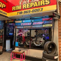 Jimmy's Rims & Tires - Front of store, next to bus stop.