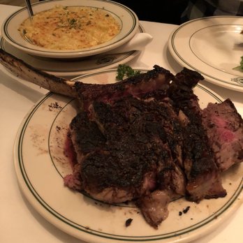 Manny's Steakhouse - 54oz Bludgeon of beef (Mac and cheese in background) - Steakhouses Near Me - Minneapolis, Minnesota Manny's Steakhouse - 54oz Bludgeon of beef (Mac and cheese in background) - Steakhouses Near Me - Minneapolis, Minnesota