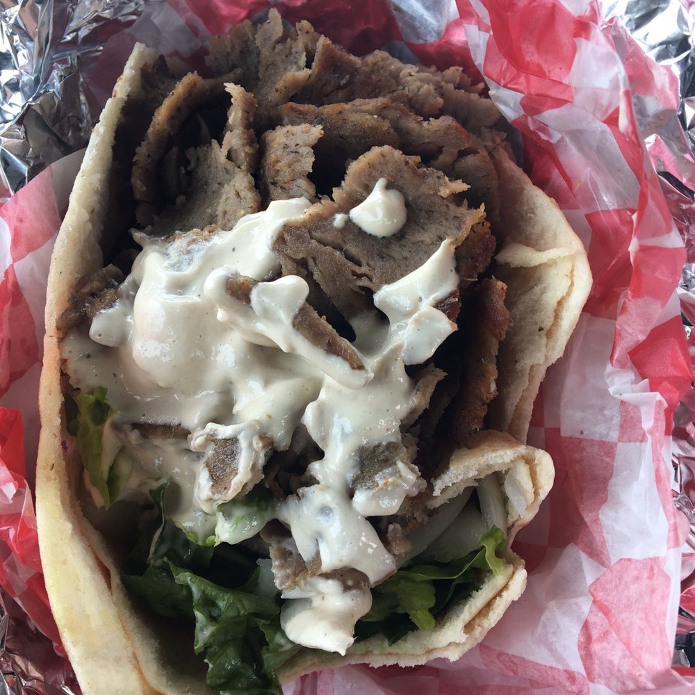 Holy Land - I added my tahini sauce to my Gyro Sandwich - Bakeries Near Me - Minneapolis, Minnesota Holy Land - I added my tahini sauce to my Gyro Sandwich - Bakeries Near Me - Minneapolis, Minnesota