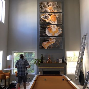 Well Hung Picture Hanging - Art on fireplace - TV Mounting Near Me
