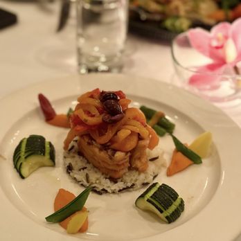 Restaurant Bonaparte - Grilled salmon fillet with marinated bell peppers - French Near Me - Montreal, Quebec