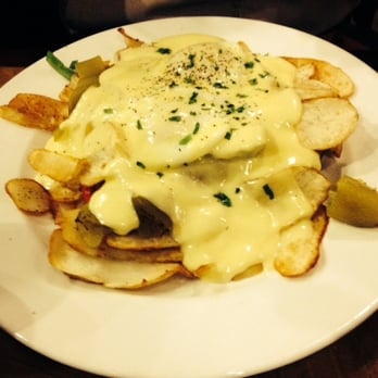 Sierra Gold - Sierra Benedict, biscuit, gr. chiles, ham, onions and creamy hollandaise sauce - New American Near Me - Reno, Nevada Sierra Gold - Sierra Benedict, biscuit, gr. chiles, ham, onions and creamy hollandaise sauce - New American Near Me - Reno, Nevada