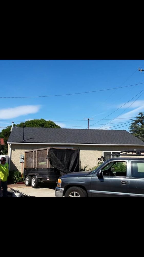 Slide of Fernandez Roofing