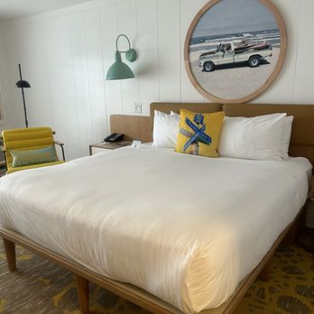 Ocean Park Inn - Another view of the room with the bed and chair. - San Diego, CA