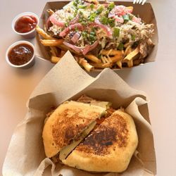 Magnolias Kitchen - Cuban sandwich and Carlos fries with regular and ancho ketchup on the side.