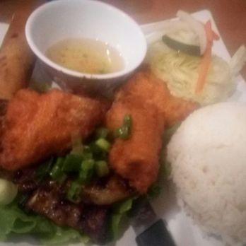 Saigon Pho - Pork chop and chicken wings with egg rolls & rice. Less than $10. Two chops!! - Vietnamese Near Me - Vacaville, California