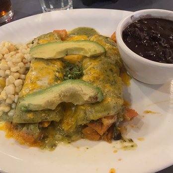 Gabriel's - Enchilada with yams and side of corn snd black beans. - Mexican Near Me - Santa Fe, New Mexico Gabriel's - Enchilada with yams and side of corn snd black beans. - Mexican Near Me - Santa Fe, New Mexico