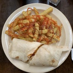 Main Street Cafe - Grilled buffalo chicken wrap and fries.