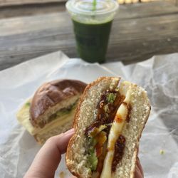 The Breakdown - Breakfast sandwich, inside has egg and avocado, I added the spicy sauce, really good