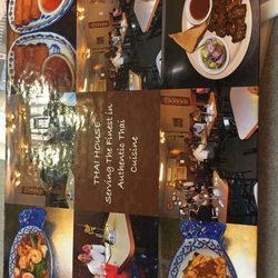 Thai House - A book with pictures of all the entrees.