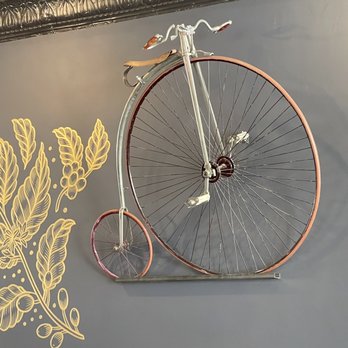 Reverie Coffee Roasters - A unicycle on the wall - Coffee & Tea Near Me - Wichita, Kansas Reverie Coffee Roasters - A unicycle on the wall - Coffee & Tea Near Me - Wichita, Kansas