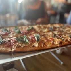 Olivella's Pizza and Wine - Fort Worth - Roman Style Regina Margherita Pizza Roman Style Black Truffle Pizza